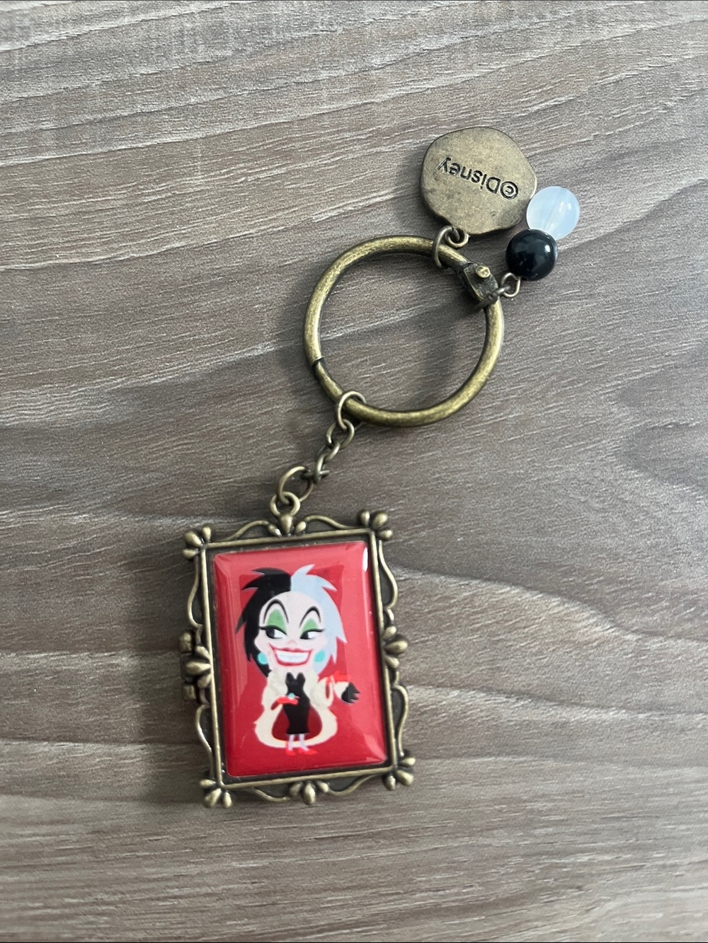 Disney Cruella Frame Keychain in Red and Black